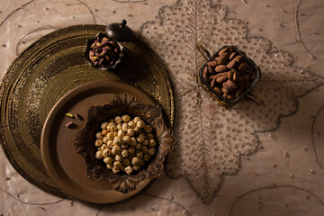 Different raw nuts ready to eat or add to some recipes and desserts. 
Hazelnut, Almonds, Peeled pistachio 