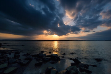 Obraz premium Amazing sunset at the ocean shore or sea. Beautiful sky with sun setting at the seaside. Ai generated