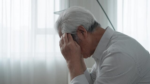 Senior man suffering from headache,4K