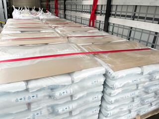 Loading, transportation and unloading of bulk materials in bags of 25 kilograms in a semi-trailer....