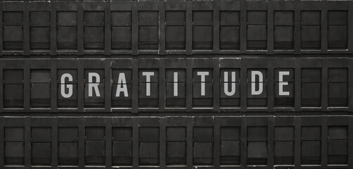 Flip board with text Gratitude