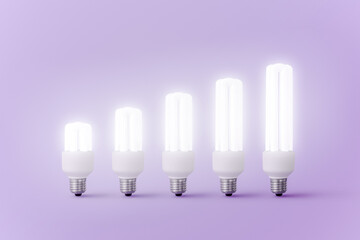 Set of burning light bulbs of different sizes