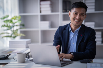businessman working on laptop at home office