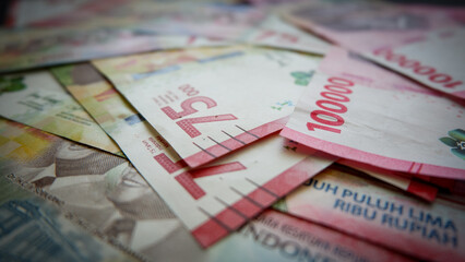 Fototapeta premium Indonesian rupiah note. Indonesian Rupiah the official Currency of Indonesia. Business concept. Uang Rupiah Indonesia. Bank Indonesia. 
