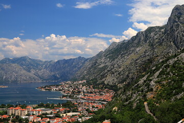 Fototapeta na wymiar high mountains in Montenegro. Beautiful Kotor Bay, old city Kotor in summer. Full top view boka kotorska, Montenegro