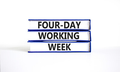 Four-day working week symbol. Concept words Four-day working week on books on a beautiful white table white background. Business and four-day working week concept. Copy space.
