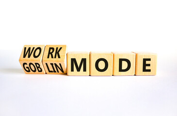 Work or goblin mode symbol. Concept word Work mode Goblin mode on wooden cubes. Beautiful white table white background. Business work or goblin mode concept. Copy space.