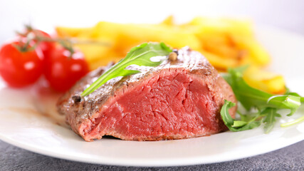 ribeye steak beef in plate with french fries