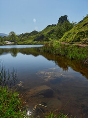 little pond in the landscape around fairy glen.