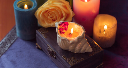 Energy healing, reiki session or chakra rituals with candles, spiritual practice. Wicca magic, new world, alternative medicine of future