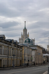 Nikoloyamskaya street in Moscow, view of the Stalin skyscraper and the Church of Simeon the Stylite beyond the Yauza