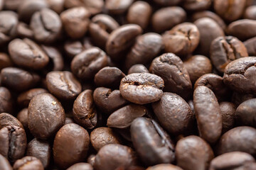 Fresh roasted brown coffee beans background