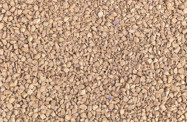 Pile of small coffee granules as a background texture composition