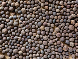 Allspice, spices background, close up