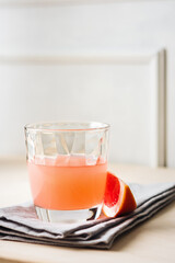 Grapefruit drink, juice with grapefruit slice.