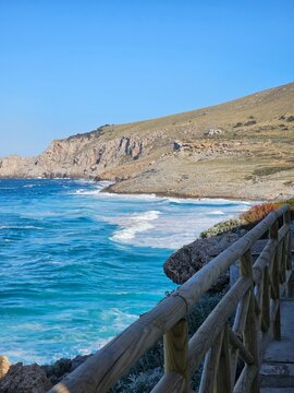 The Rhythmic Motion of the Waves: A Telephoto View from Afar