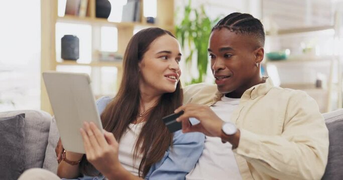 Tablet, couple and credit card for online shopping in home on sofa, payment or digital banking. Interracial, ecommerce and happy black man and woman laugh with tech for fintech, sales app or finance.
