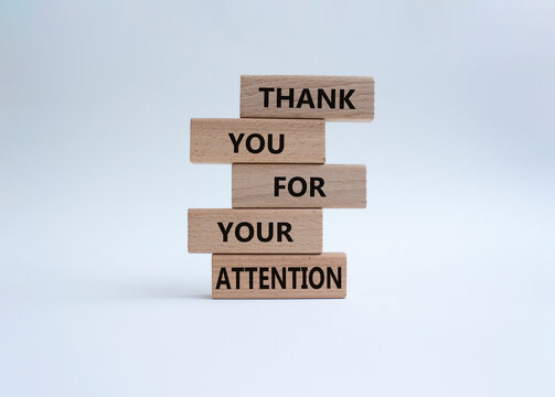 Attention symbol. Wooden blocks with words Thank you for your attention. Beautiful white background. Business and Thank you for your attention concept. Copy space.