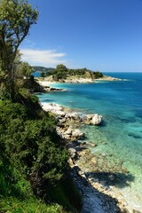 Kassiopi beach, Corfu island, Greece, the beautiful coast of a Northern small town.