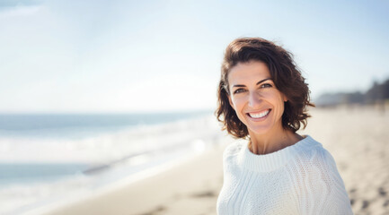 Serenely smiling brunette woman at the beach in light-colored clothes, shallow depth of field with blurred sea background. Generative AI
