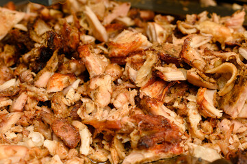 Chopped and already cooked fried chicken meat