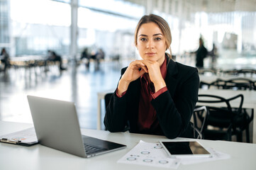 Beautiful confident successful influential caucasian business lady, in elegant clothe, director of...