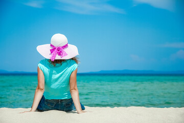 Fototapeta na wymiar happy girl at sea in greece on sand nature
