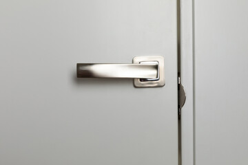 Close-up door locks for reliable protection of the apartment door. Door handle with white door...