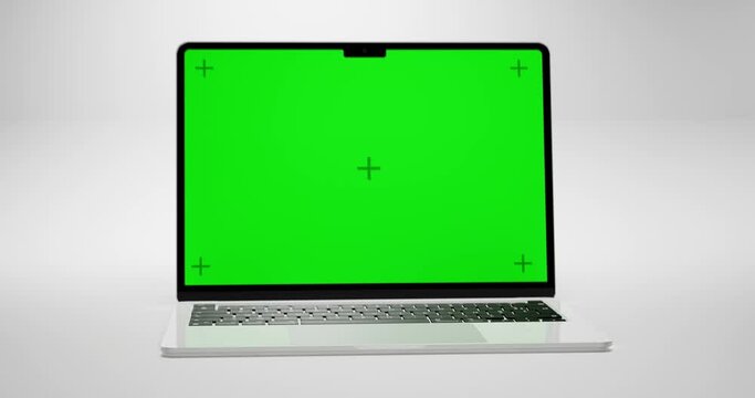 Green Screen Display Laptop Opens On A White Background. Empty Green Mock-Up Monitor For Video Call, Website Template Presentation Or Game Applications. Blank Screen Monitor 3D Render
