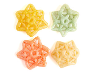 Cooked Star Shaped Fryums on a White Background
