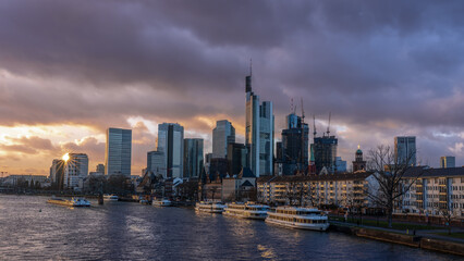 Frankfurt am Main, Germany, a sun star in the city skyline in the evening hours