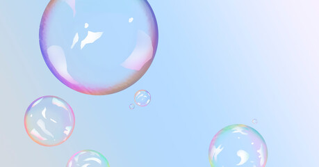 Several colorful bubbles on a blue background with copy space.