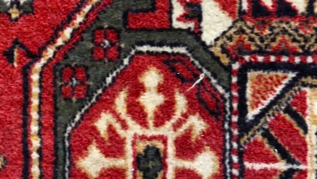 wool persian carpet pattern, camera in motion