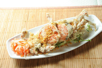 Vietnamese Salt and Pepper Soft Shell Crab served in dish isolated on table seafood