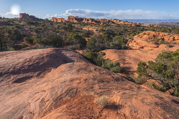 hiking the broken arch trail in arches national park, utah, usa