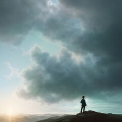 Obraz premium Stunning Illustration of Silhouette Of a Man Standing On A Mountain Top During A Cloudy Sunset - Generative A.I. Art