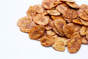 Banana chips on white background