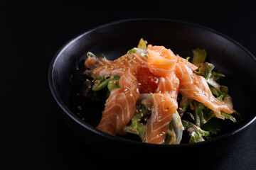 Japanese salad isolated in black background