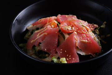 Japanese salad isolated in black background