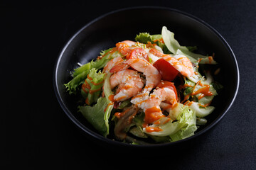 Japanese salad isolated in black background