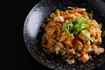Japanese fried rice yakimeshi isolated in black background