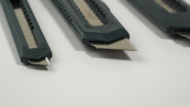 Set of box cutter on a white background. Stationery knife set.