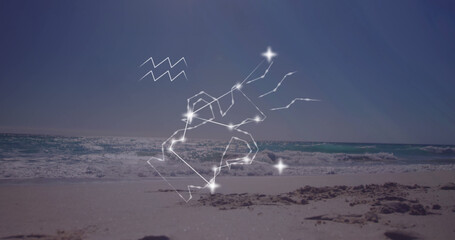 Image of aquarius star sign with glowing stars over sea and beach
