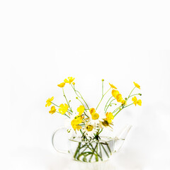 Teapot with yellow flowers