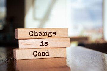 Wooden blocks with words 'Change is Good'.