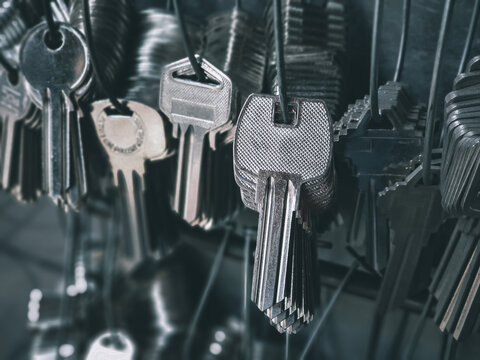 Many key chains for copy key on locksmith shop.