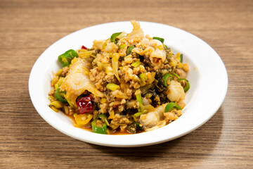 Spicy Pig fish Alliance served in dish isolated on mat top view on wooden table Hong Kong food