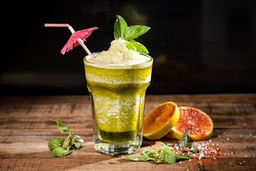 mojito cocktail on wooden table