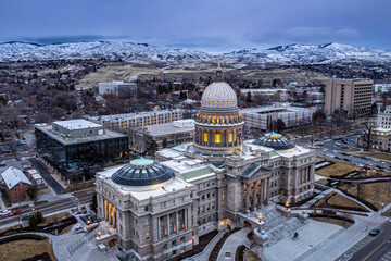 Idaho State Capitol in Boise at Dusk with Snow-covered mountains in the background