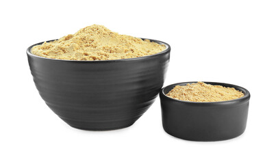Bowls with aromatic mustard powder on white background